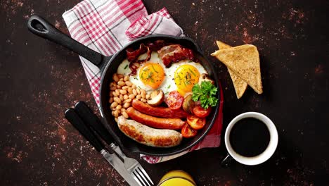 delicious english breakfast in iron cooking pan