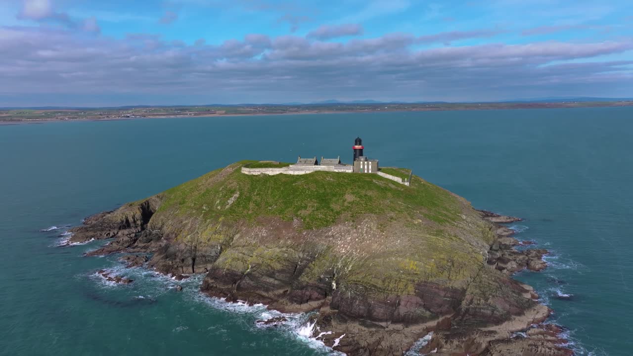 4K Cinematic Drone shot of the black Ballycotton Lighthouse overlooking the Atlantic Ocean, a symbol of Ireland’s maritime heritage Co.Cork - Ireland_17