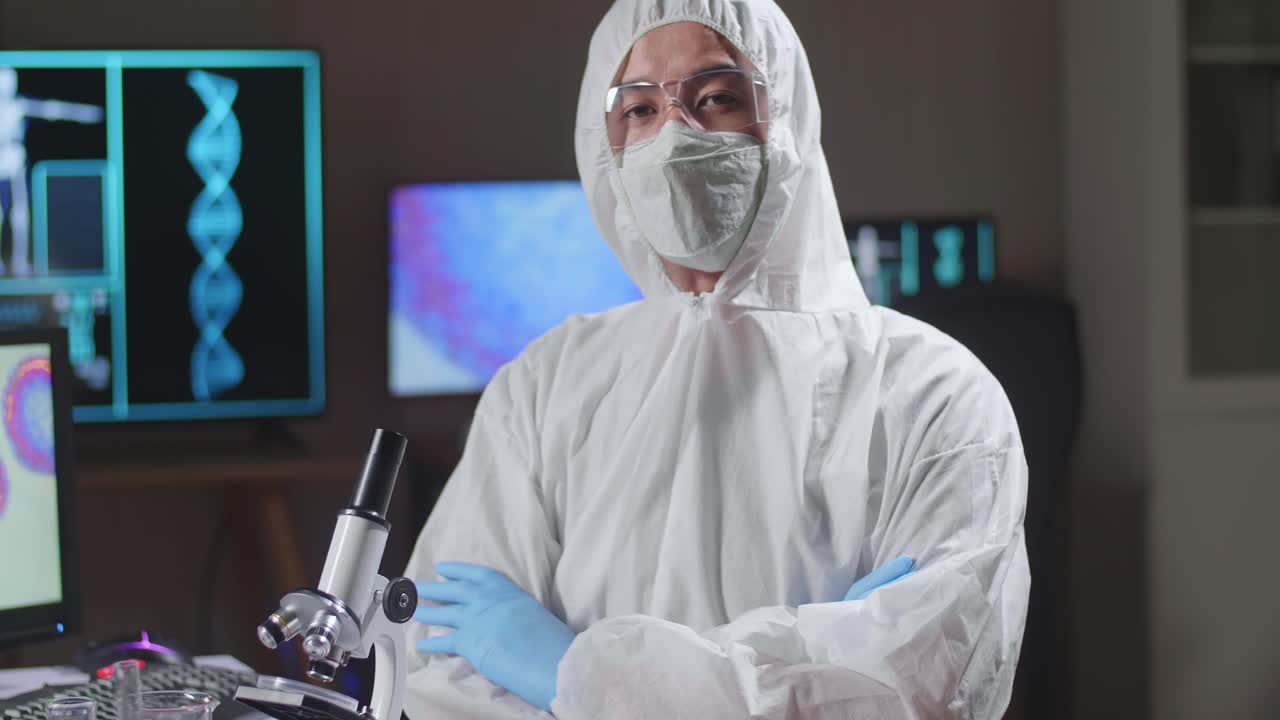 Asian Doctor Pose In A Modern Laboratory. Genetic Engineers Workplace. The Concept Of Science And Medicine