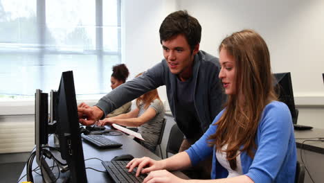 students working together in computer room