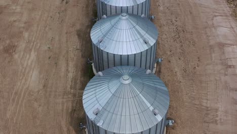 drone shot of towering grain silos in northern british columbia