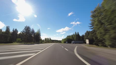 hyperlapse drive: pov highway driving on quiet rural highway, sunny