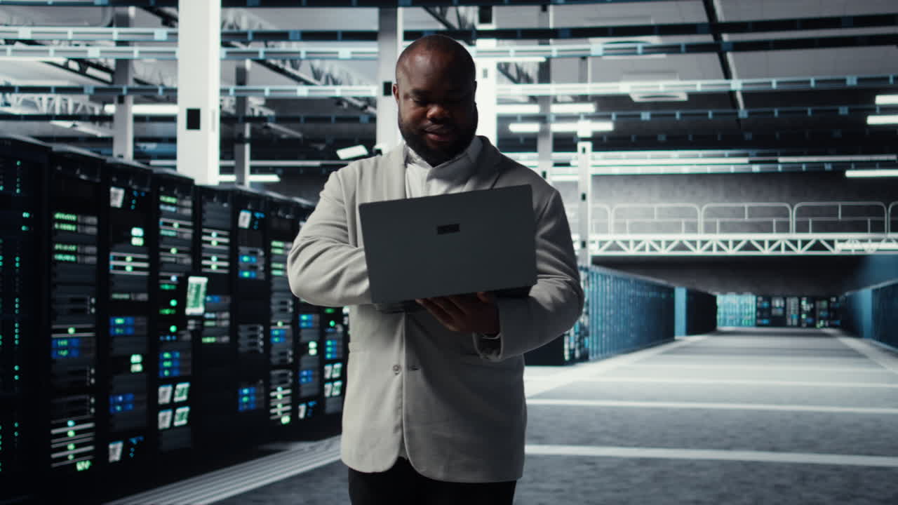 Vertical video Data center system administrator reviewing code for automation scripts