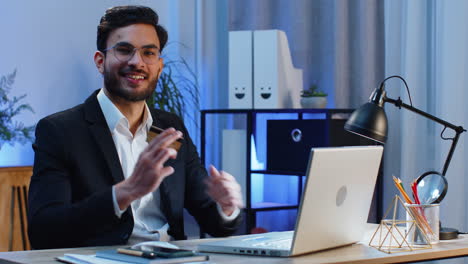 business man making online purchase payment shopping with credit bank card and laptop at office