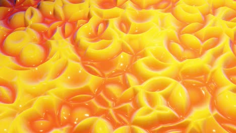 looped festive liquid bg in 4k. abstract wavy pattern on bright glossy surface, liquid gradient yellow red, waves on paint fluid in smooth animation. glitters on viscous 3d liquid. creative backdro