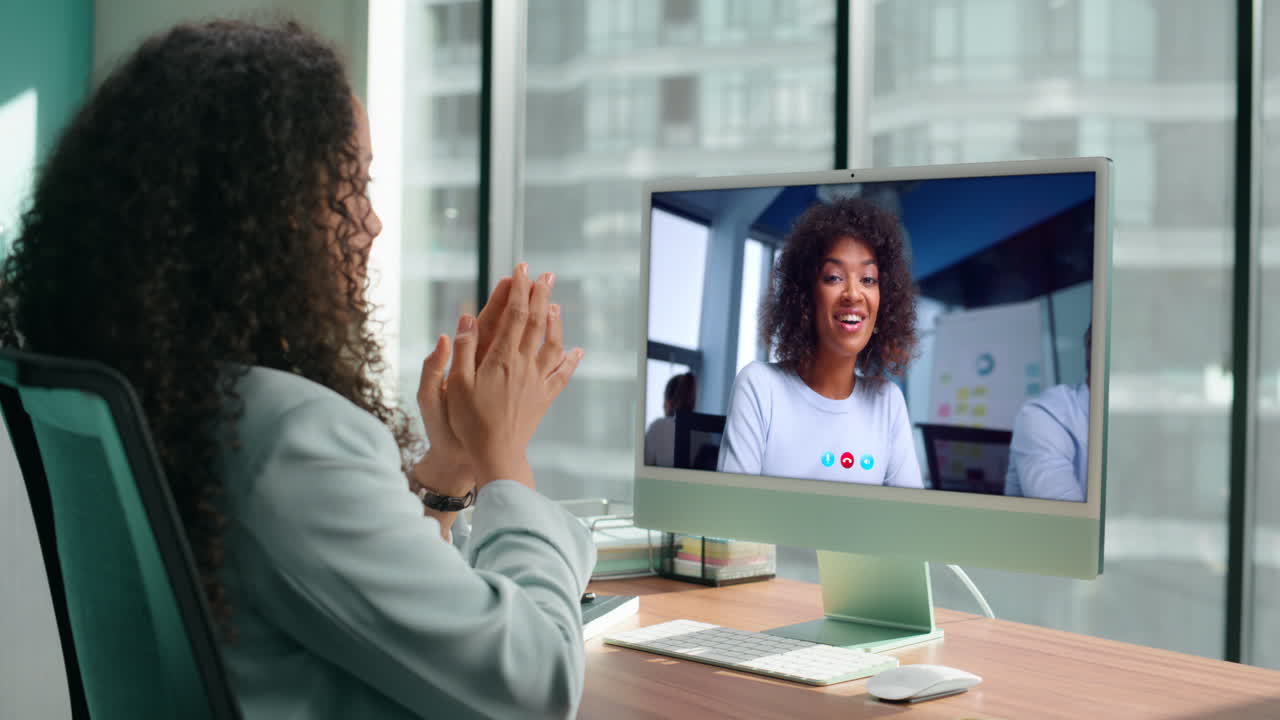 Businesswomen discussing project video call using office computer close up