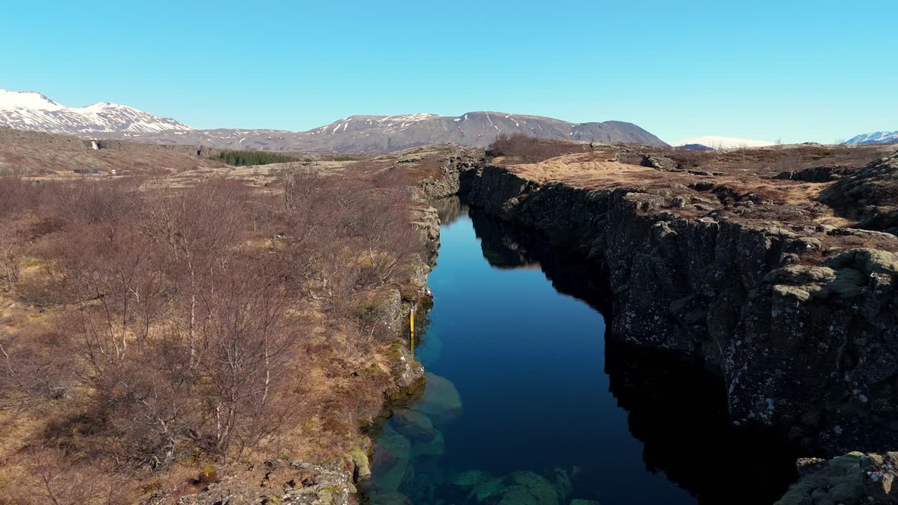 Aerial view of the beautiful Oxararfoss waterfall between tectonic plates, inside the Thingvellir National Park, Iceland