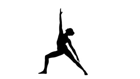 woman doing yoga in black silhouette