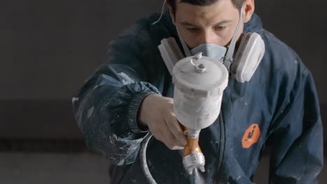 worker spray painting