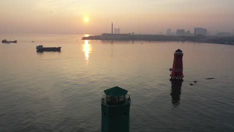 sunrise over the port and lighthouses