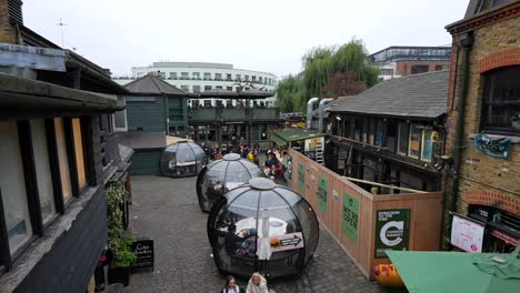 crowded outdoor seating area in london