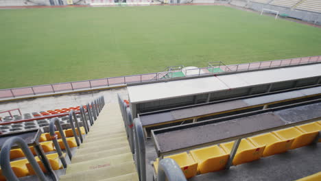 empty sports stadium grandstand and field