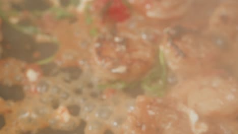 shrimp with vegetables cooking in pan