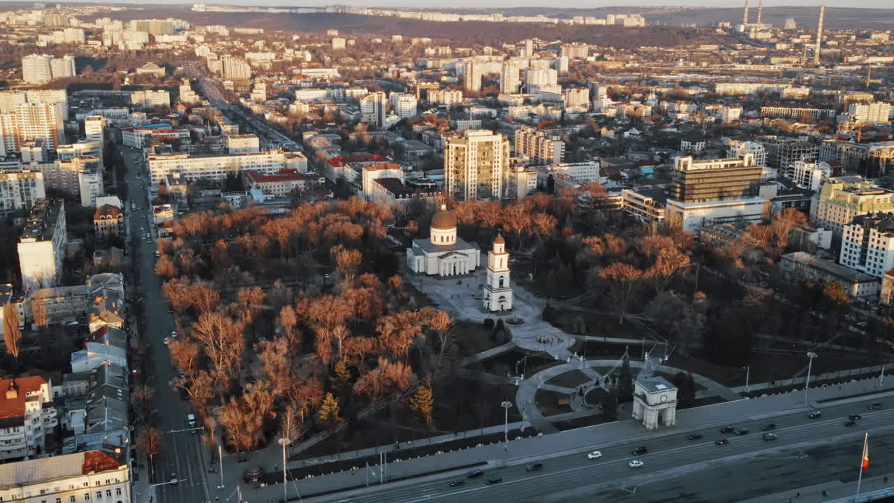 Aerial drone view of Chisinau downtown. Panorama view of central park with bare trees, catheral. Moldova