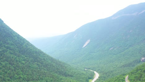 drone panning over mountain valley of new hampshire landscape