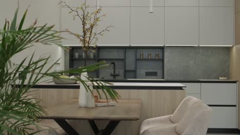 modern beige and grey kitchen with wooden table