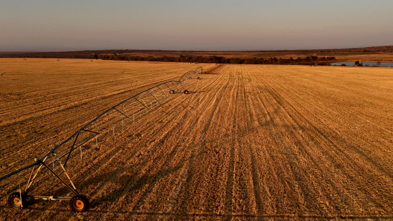 Drone flight over central pivot irrigation system on dry South African farm land