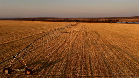 drone flight over central pivot irrigation system on dry south african farm land