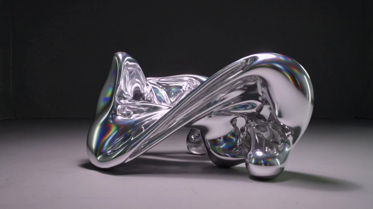 Animation starting, mirrored sculpture stretching and reclining on gray floor showing rounded feet