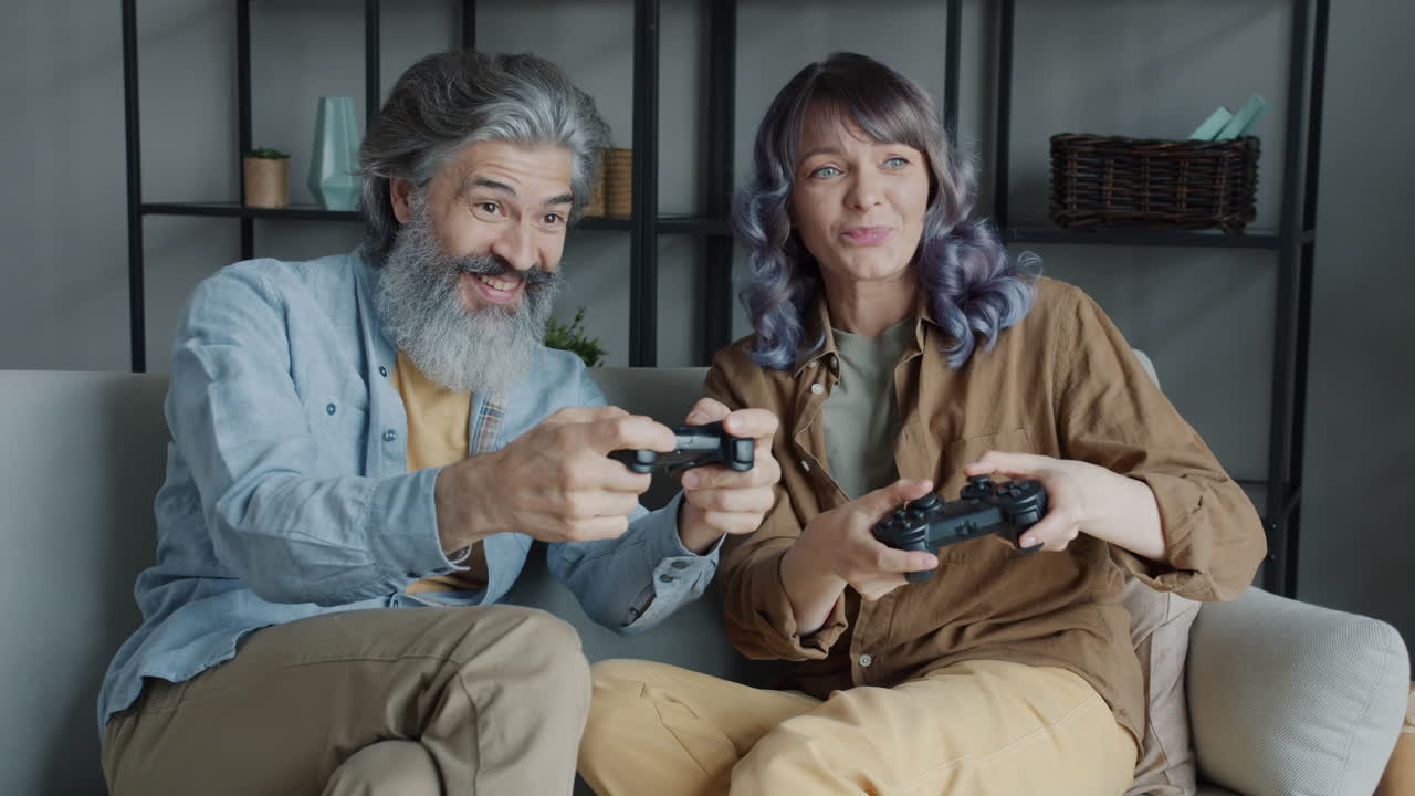 Happy Couple Playing Video Games at Home