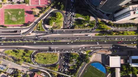 overhead view over the main's highway of santiago de chile on a sunny day with cars in the background