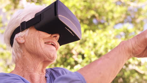 Senior-woman-wearing-virtual-glasses