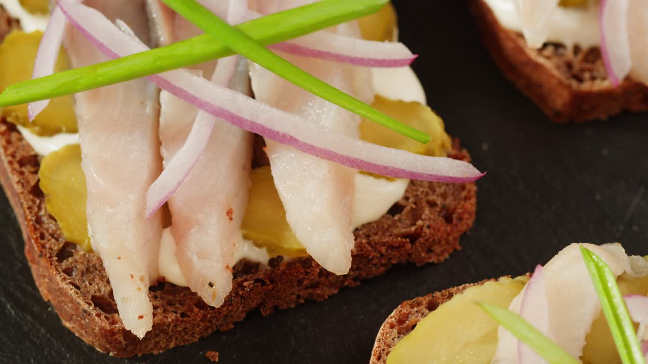 Open-Faced Sandwiches with Herring, Pickles, and Onions
