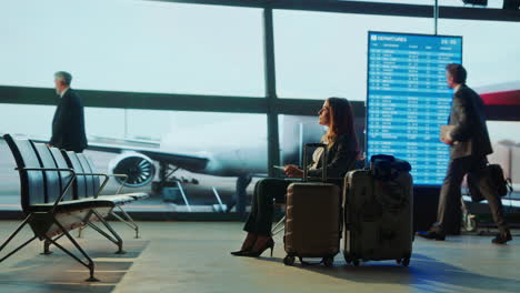 people waiting at airport terminal