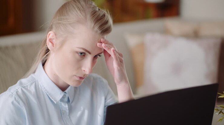 Beautiful Thoughtful Concerned Woman Working On Laptop 3