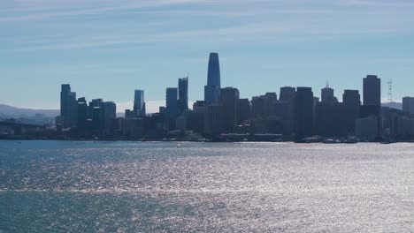 telephoto drone shot of downtown san francisco across the san francisco bay