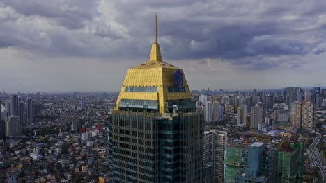 panning-shot-of-a-golden-tower-in-the