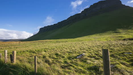 time lapse of rural farming landscape with grass field at benbulben mountain on sunny day in county sligo in ireland