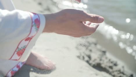 woman on a beach with traditional clothing