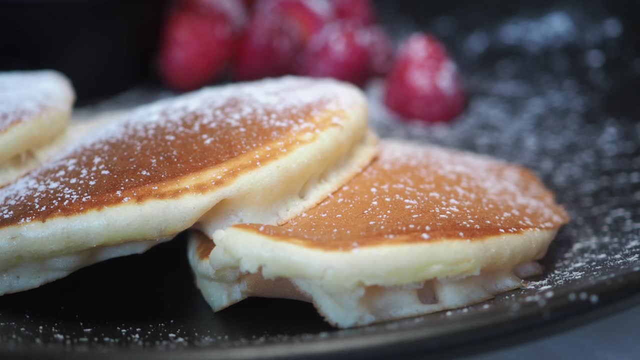 Pancakes with Strawberries and Powdered Sugar