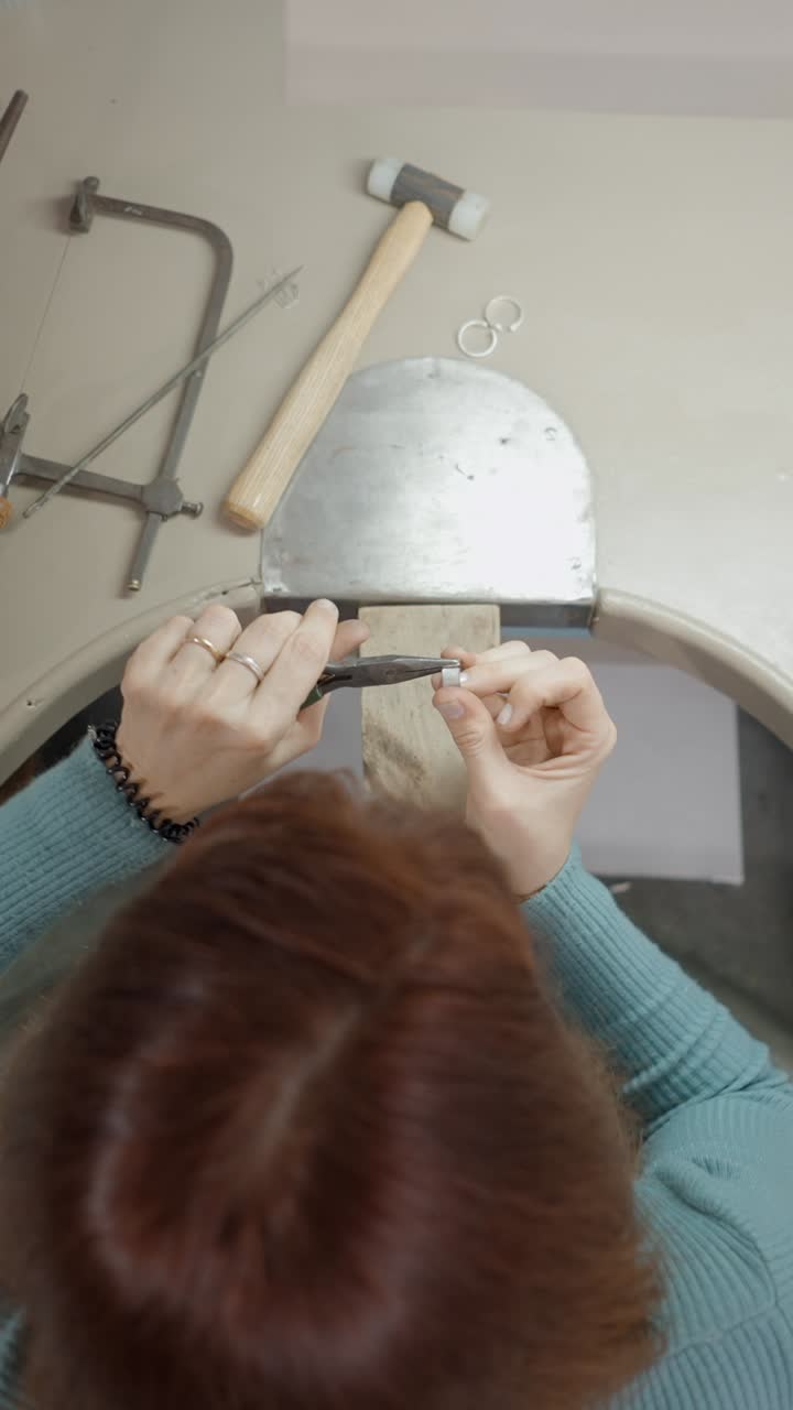 Close-up of Hands Crafting Jewelry