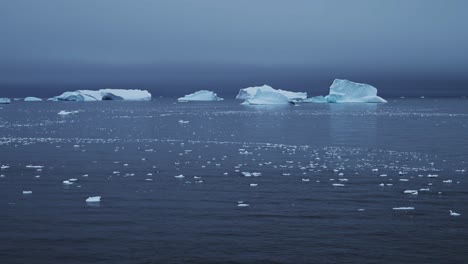 Antarctica-Scenery-of-Icebergs-and-Ice-on-Antarctic-Peninsula-in-Vast-Endless-Dramatic-Landscape,-Beautiful-Seascape-with-Big-Unusual-Shapes-in-Blue-Winter-Coastal-Scene