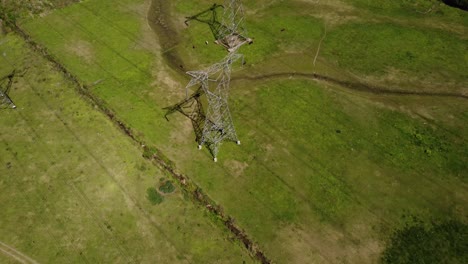 aerial view of transmission towers in rural area