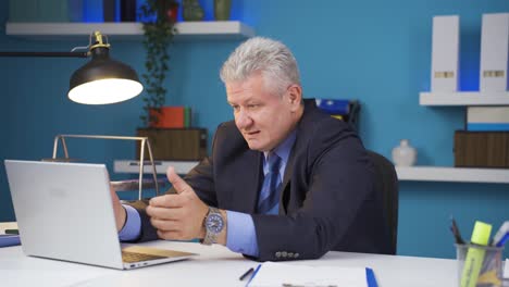 businessman feeling positive gesture on laptop.