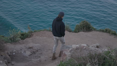 Adult-male-explores-Bixby-Bridge-in-the-early-morning