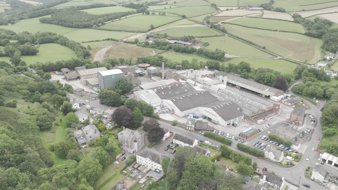 Aerial view of a large industrial complex in a rural countryside setting