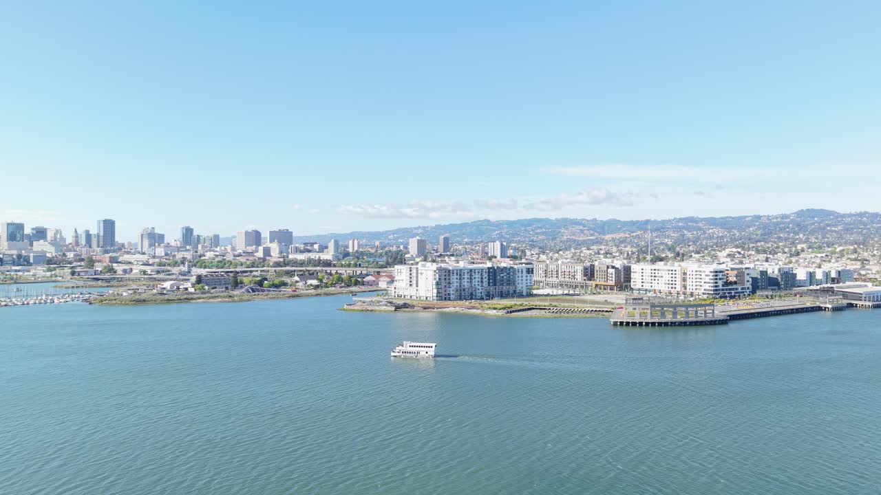Oakland’s waterfront unfolds from above, highlighting the blend of urban energy and harbor tranquility.