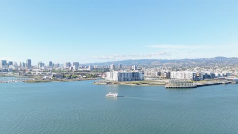 oakland’s waterfront unfolds from above, highlighting the blend of urban energy and harbor tranquility.