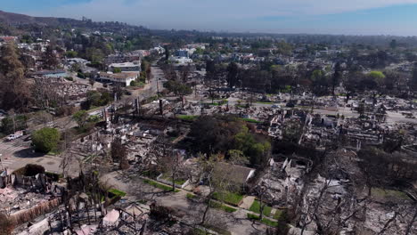 aerial view of widespread fire damage in a residential neighborhood