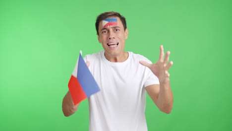 man cheering for philippines during a match that is lost
