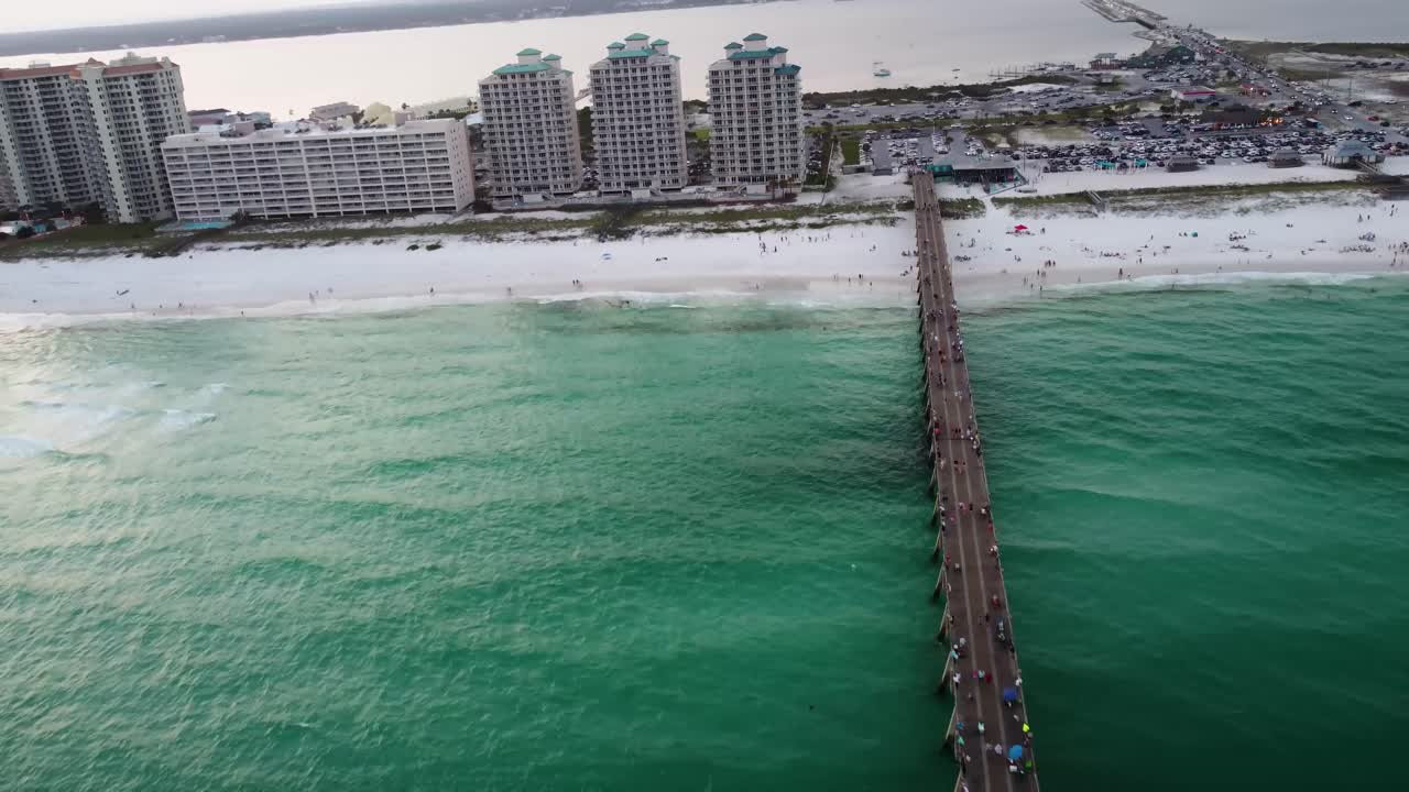 Aerial View of Crowded Beach Pier and Condos