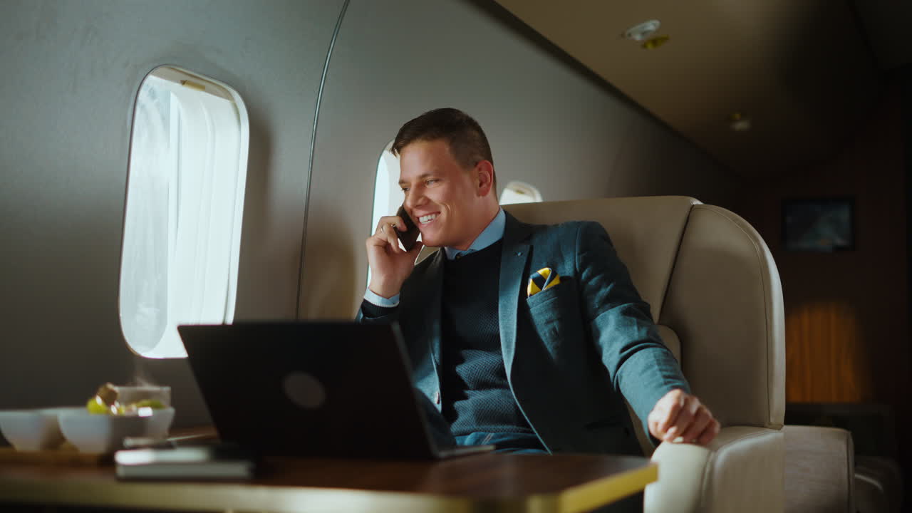 Businessman working on a private jet