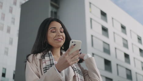 businesswoman having video chat on smartphone. professional chatting on phone