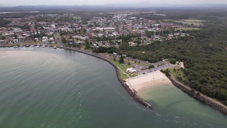 coolongolook river, tuncurry rock pool, and coastal town in nsw, australia. - aerial shot