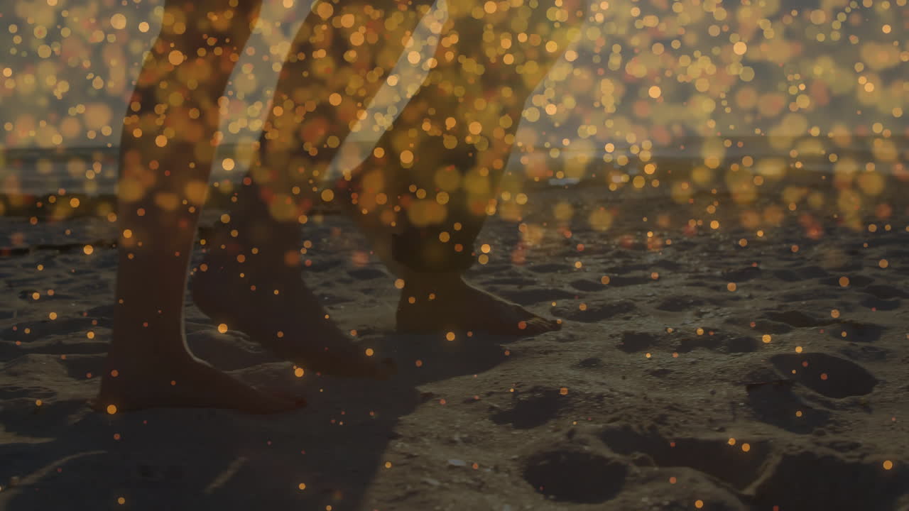 Couple walking on wet beach sand at sunset, showcasing animated travel marketing icons and bokeh