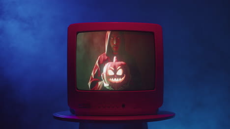 vintage tv showing a halloween scene
